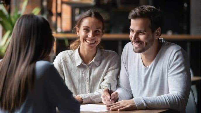 Couple Signing Mortgage