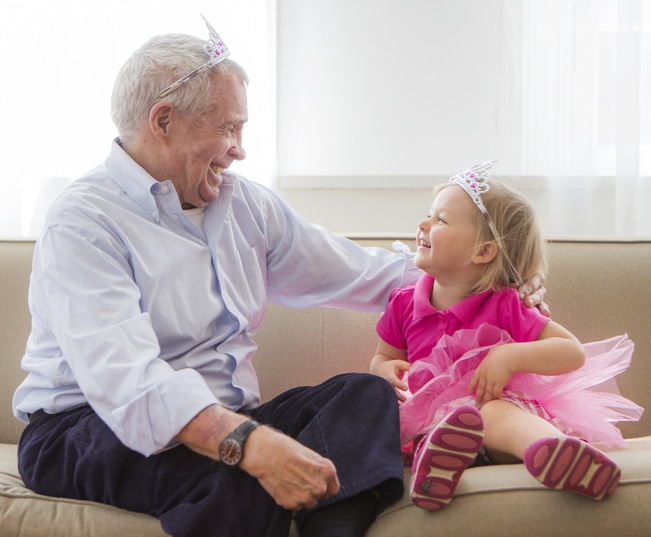 Grandpa and grandaughter playing princess